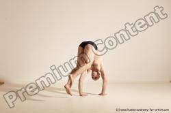 Underwear Gymnastic poses Man White Slim Bald Brown Dancing Dynamic poses Academic